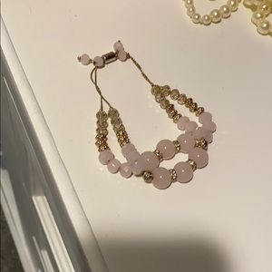 Black house white market pink bracelet